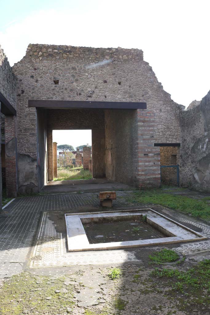 I.9.1 Pompeii. December 2018. 
Room 2, looking south across impluvium in atrium towards tablinum. Photo courtesy of Aude Durand.