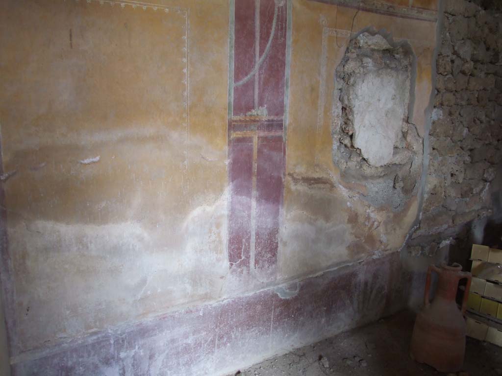 I.9.3 Pompeii. March 2009. 
Room 10, north wall with site of painting of Successus, and hole made by ancient searchers, now filled in on the right.