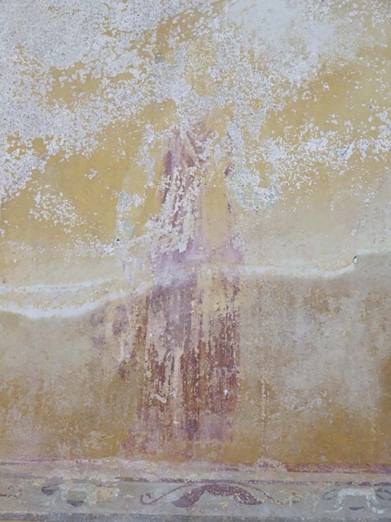 I.9.3 Pompeii. March 2009. Room 10, painted decoration from upper area of south wall.  
According to PPM, this was a bacchic figure.