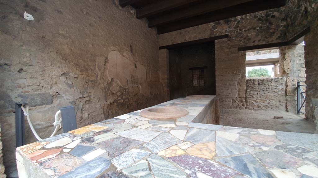 I.9.4 Pompeii. July 2021. Looking south-east across podium towards rear room. 
Foto Annette Haug, ERC Grant 681269 DÉCOR.