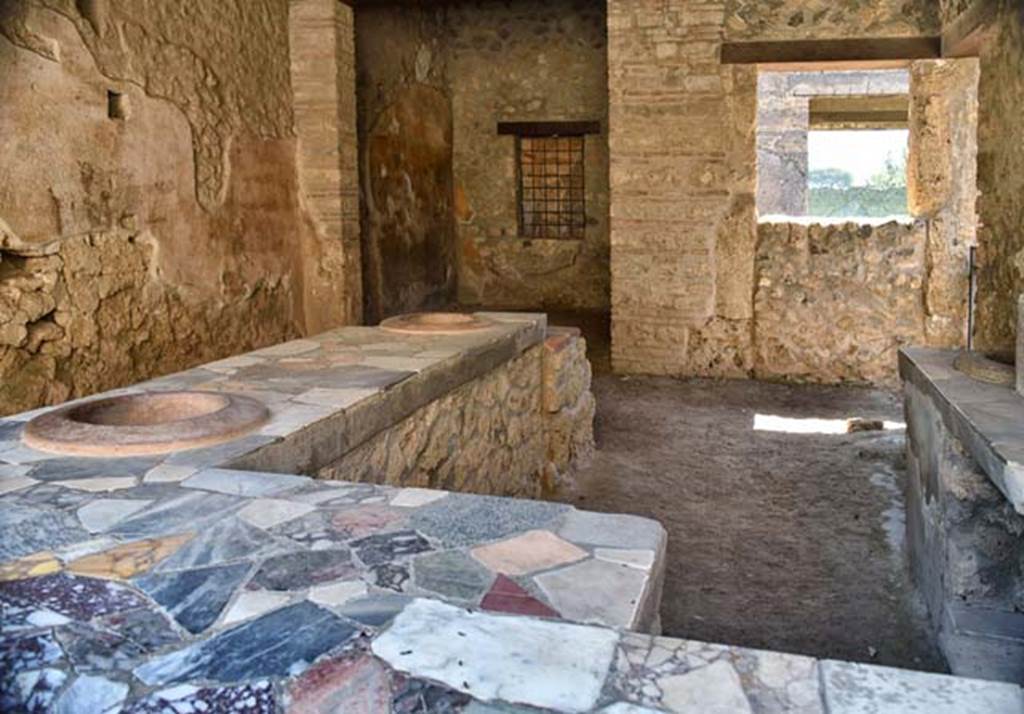 I.9.4 Pompeii. April 2018. Looking south across bar-room. Photo courtesy of Ian Lycett-King. 
Use is subject to Creative Commons Attribution-NonCommercial License v.4 International.