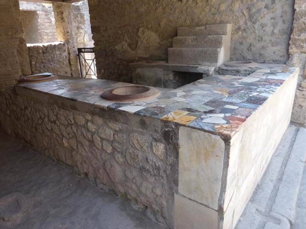 1.9.4 Pompeii. June 2012. Looking south-west across bar and counter. Photo courtesy of Michael Binns.