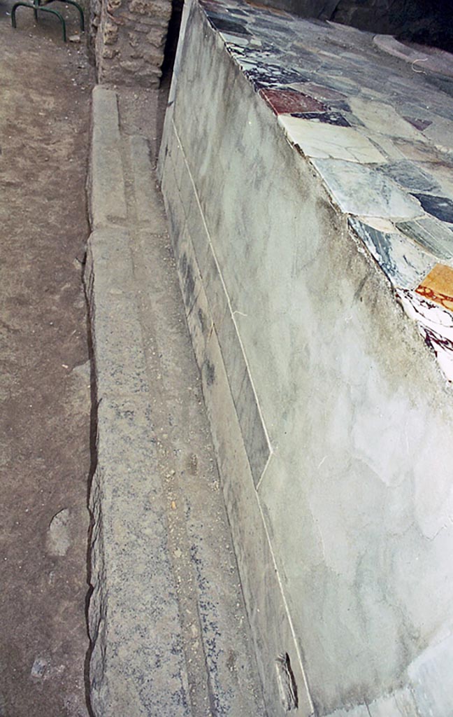 I.9.4 Pompeii. October 2001. 
Looking east along front of counter and entrance sill. Photo courtesy of Peter Woods.