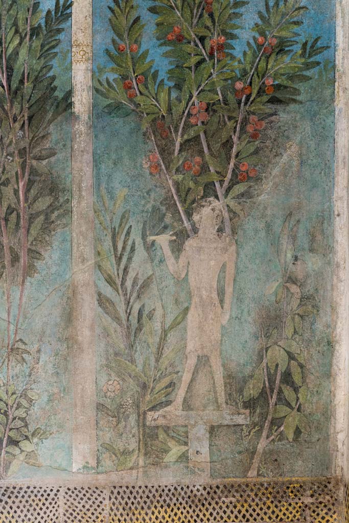 I.9.5 Pompeii. April 2022. Room 5, cubiculum. South end of east wall. 
Detail of painting of Egyptian pharaonic statue and cherry tree.
Photo courtesy of Johannes Eber.