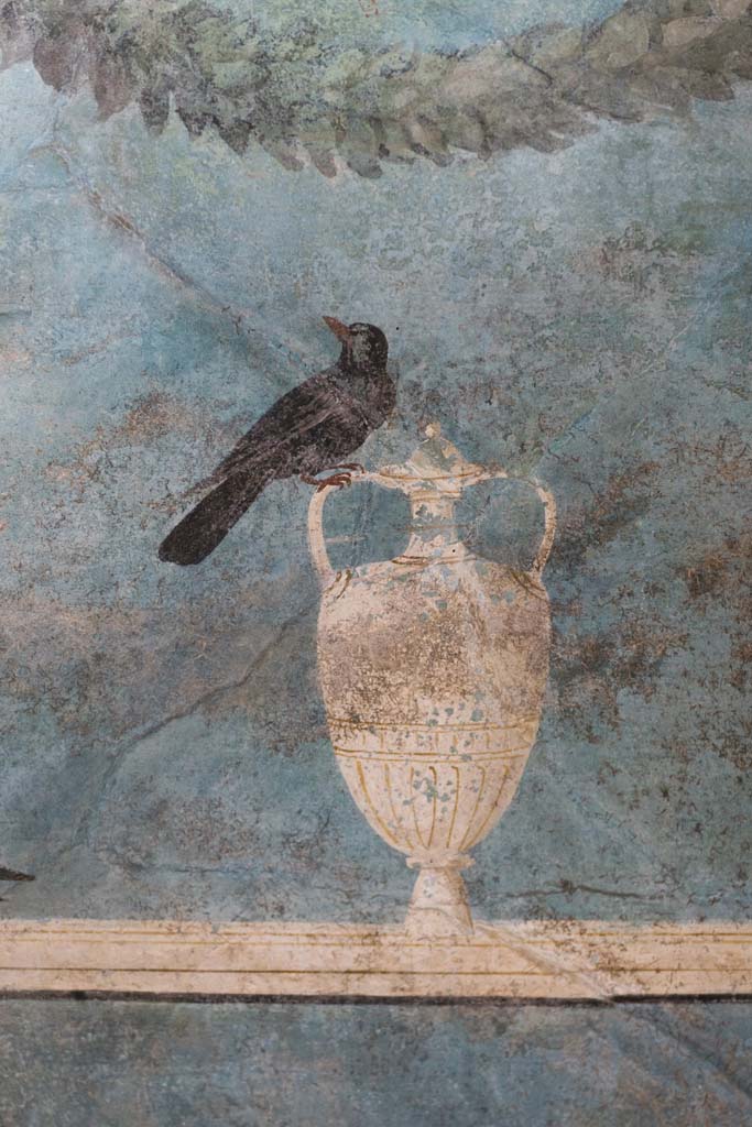 I.9.5 Pompeii. April 2022. Room 5, cubiculum. Upper south wall with painting of bird on vase.
Photo courtesy of Johannes Eber.