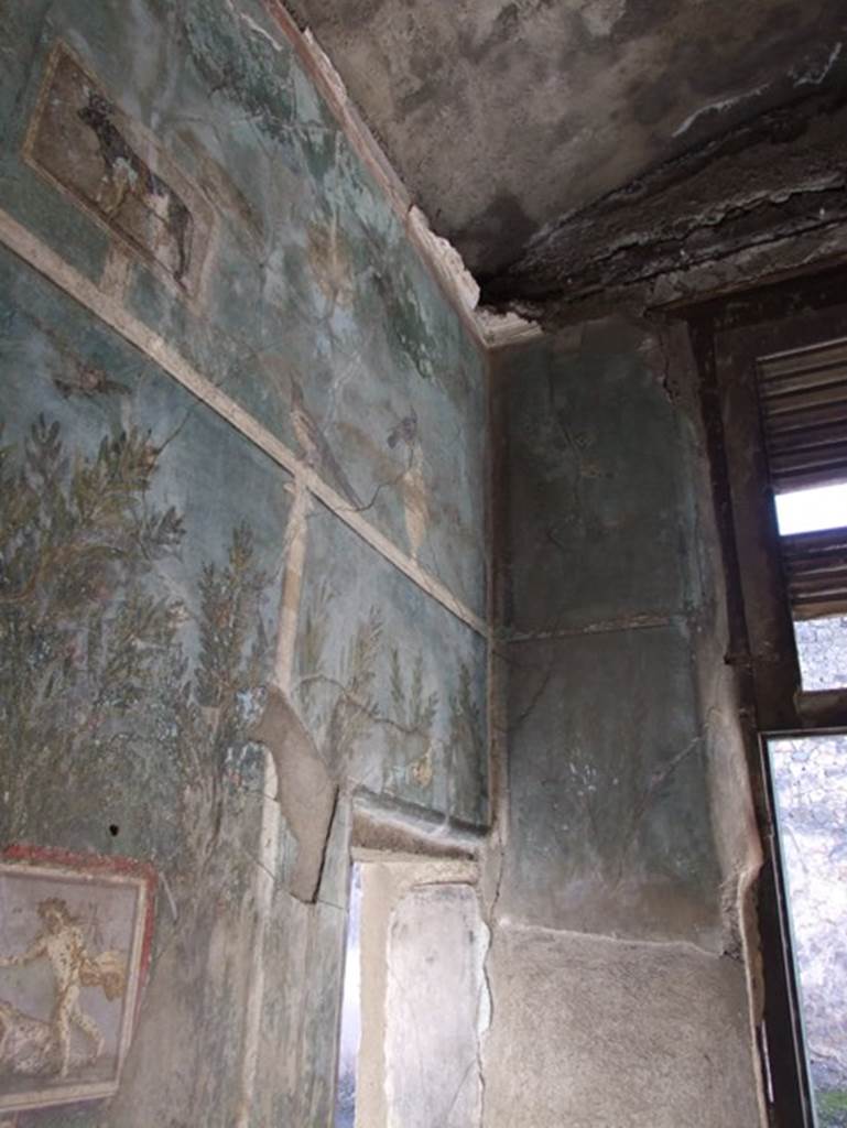 I.9.5 Pompeii. March 2009. 
Room 5, looking towards south-west corner and narrow west wall with cornice of stucco, above.