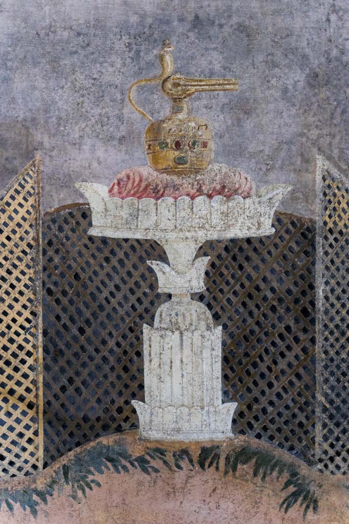 I.9.5 Pompeii. April 2022. 
Room 11, looking towards centre of east wall with painted table with Isis jug or jar. 
Photo courtesy of Johannes Eber.