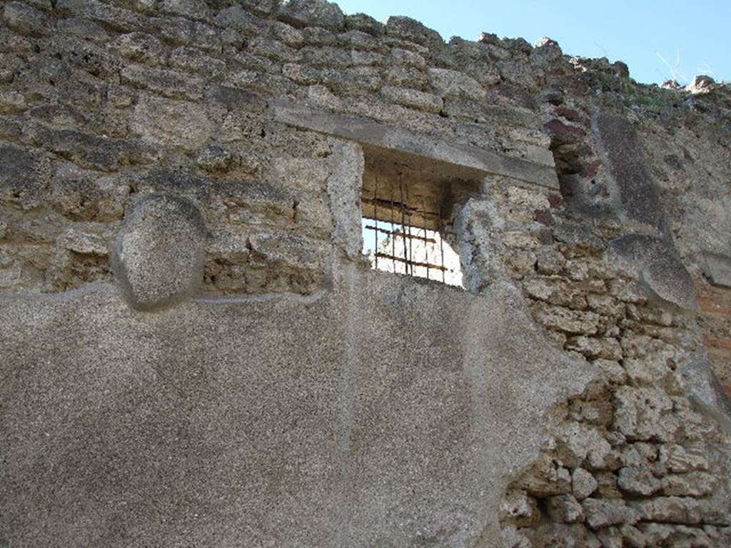 I.9.8 Pompeii. September 2005. Exterior wall with window.