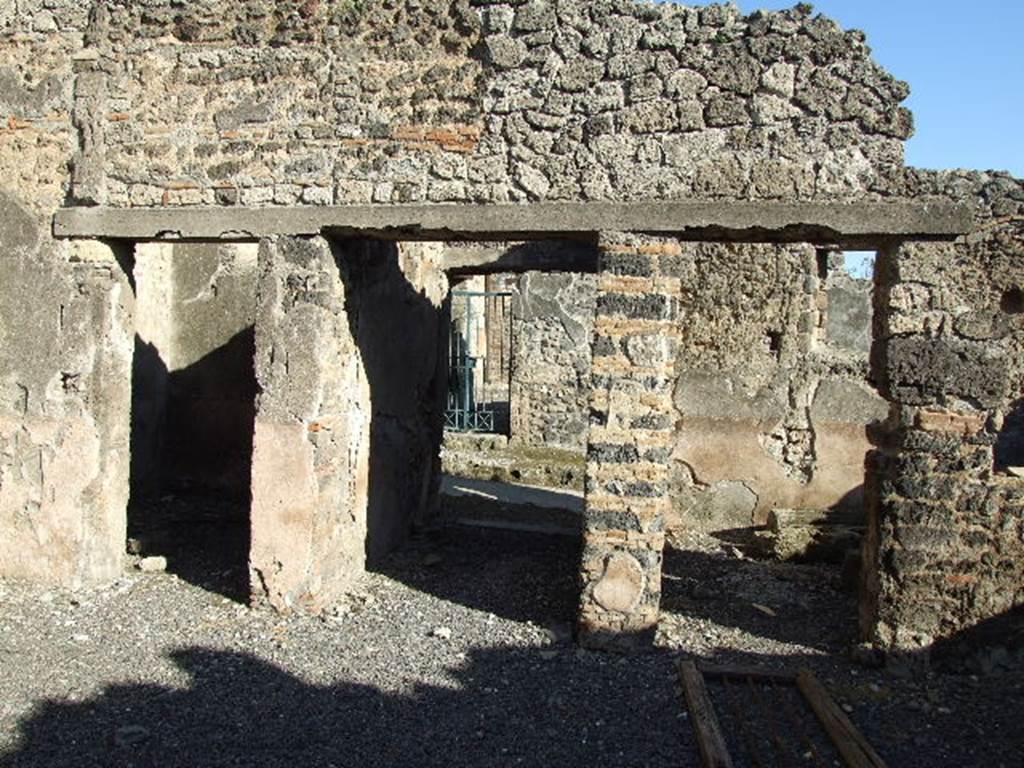 I.9.8 Pompeii. December 2006. Looking east across atrium to entrance corridor, in centre.