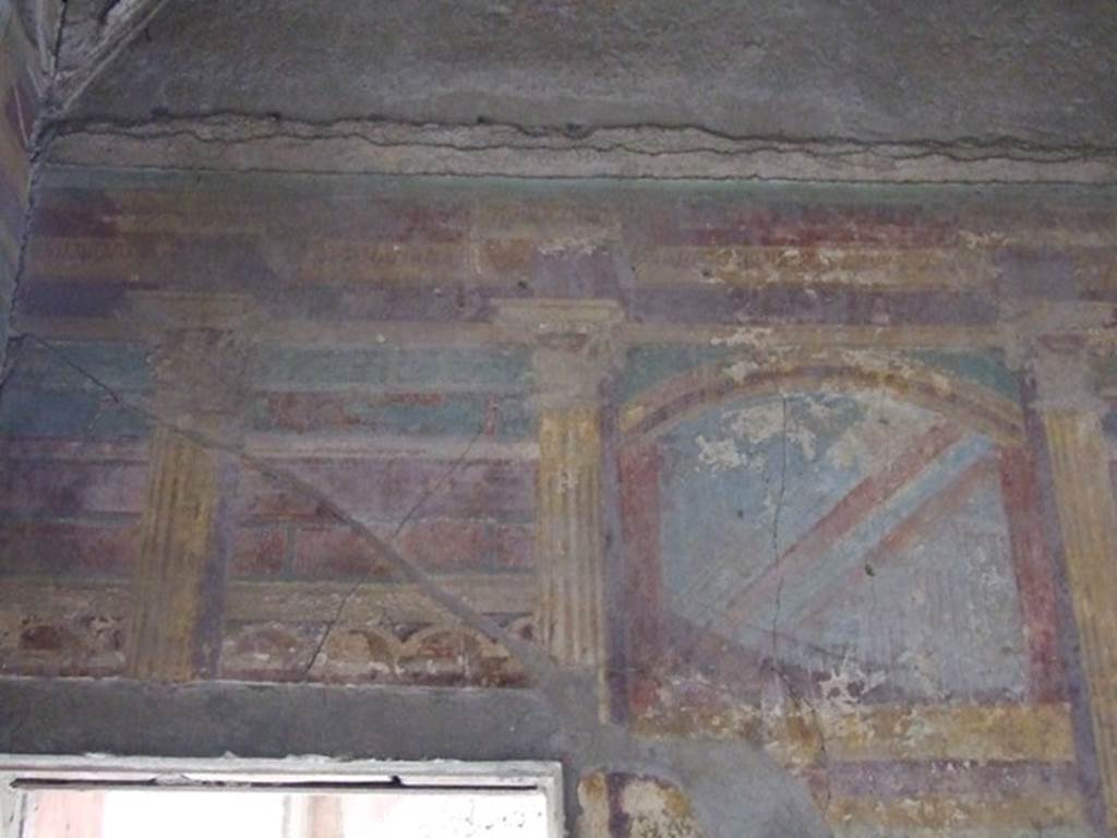 I.9.14 Pompeii. March 2009. Room 7, upper part of east wall.