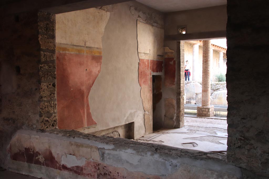 I.9.14 Pompeii. October 2022. 
Room 8, window in north wall of atrium into tablinum 6, looking towards west wall with doorway into room 7. Photo courtesy of Klaus Heese.