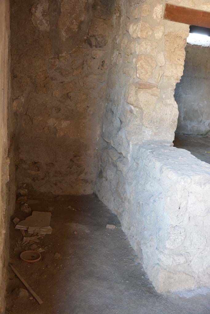 I.10.1 Pompeii. April 2017. Looking east from entrance doorway, into latrine. 
Photo courtesy Adrian Hielscher.