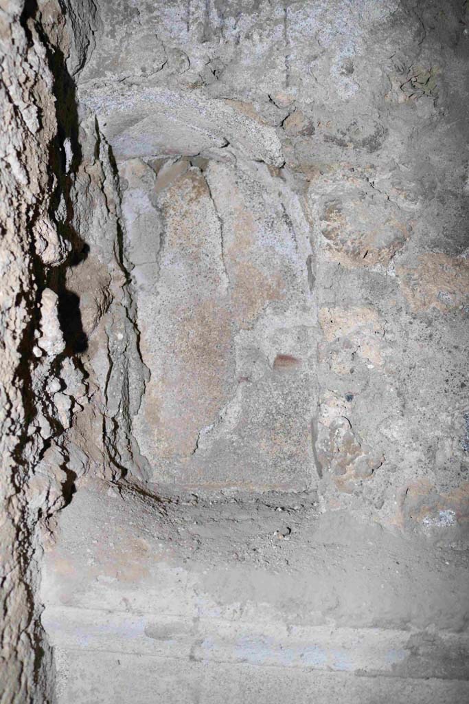 I.10.1 Pompeii. December 2018. 
Detail of niche divided from its two other niches, by the building of the wall of the latrine.
Photo courtesy of Aude Durand.