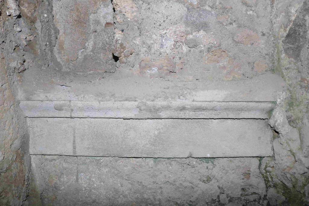 I.10.1 Pompeii. December 2018. South wall of latrine, below niche. Photo courtesy of Aude Durand.
According to NdS, all three niches were found with a shelf of rustic plaster below, formed with a fascia and cornice.
See Notizie degli Scavi di Antichità, 1934, p. 268-9, fig 3 above.
On the south wall of the latrine, it has survived. In the open uncovered area beneath the two niches, it has disappeared.
