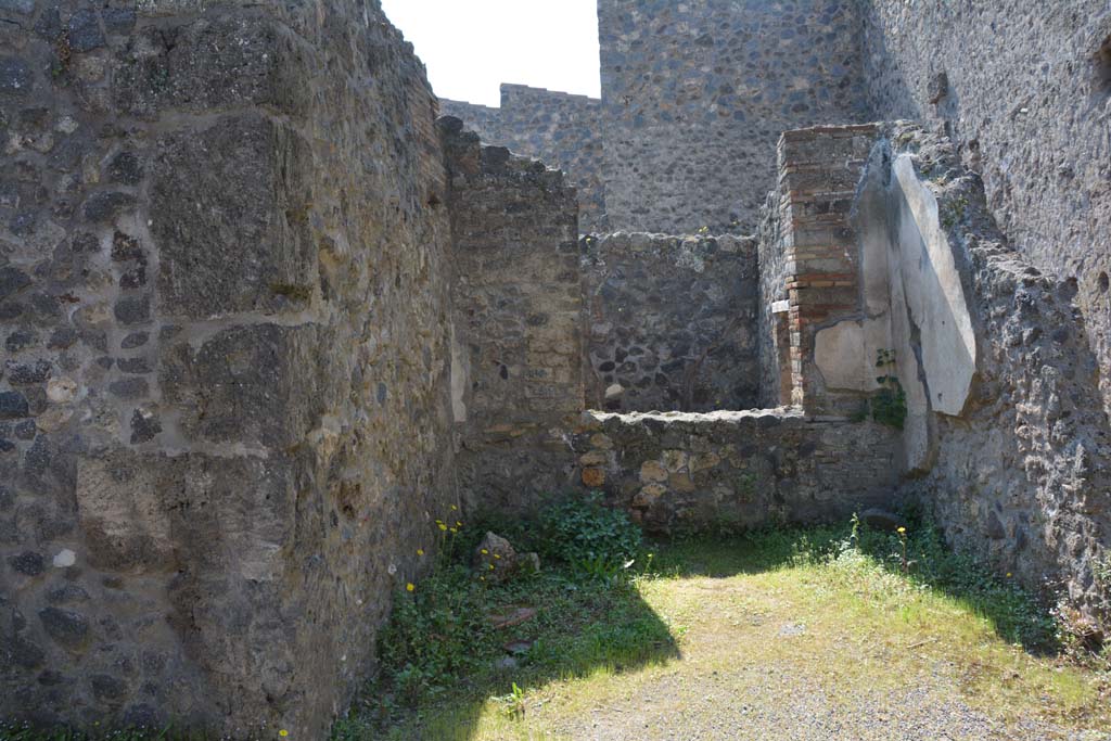 I.10.3 Pompeii. April 2017. Looking south into tablinum (room 6 on plan), with window in rear wall into small room (11 on plan).
Photo courtesy Adrian Hielscher.