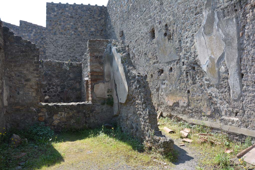I.10.3 Pompeii. April 2017. Looking across atrium towards west side of tablinum, and room 9 on plan, on right. 
Photo courtesy Adrian Hielscher.
According to NdS, 
“Room 9 was a corridor with steps to the upper floor, which probably had only two or three rooms overlooking the front of the roadway, and perhaps one built above the pseudo-atrium. The fall of the upper walls and the state of conservation of the few left standing, with traces of 4th Style decoration, do not give a clear interpretation of the distribution of rooms.”
See Notizie degli Scavi di Antichità, 1934, 274-5.
