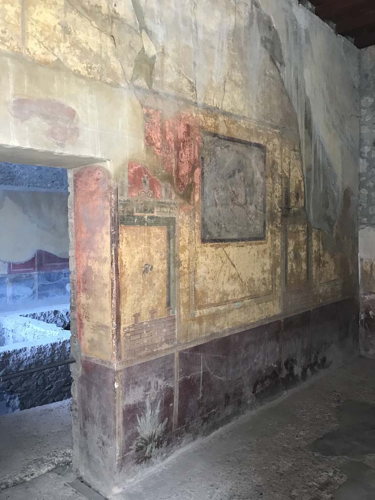 I.10.4 Pompeii. April 2019. Room 19, north wall with doorway to room 18. 
Photo courtesy of Rick Bauer.