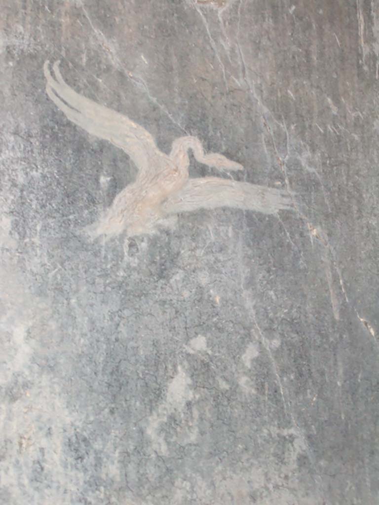 I.10.4 Pompeii. December 2005. 
Fauces or entrance corridor. Painting of bird (swan?) with wings outstretched.