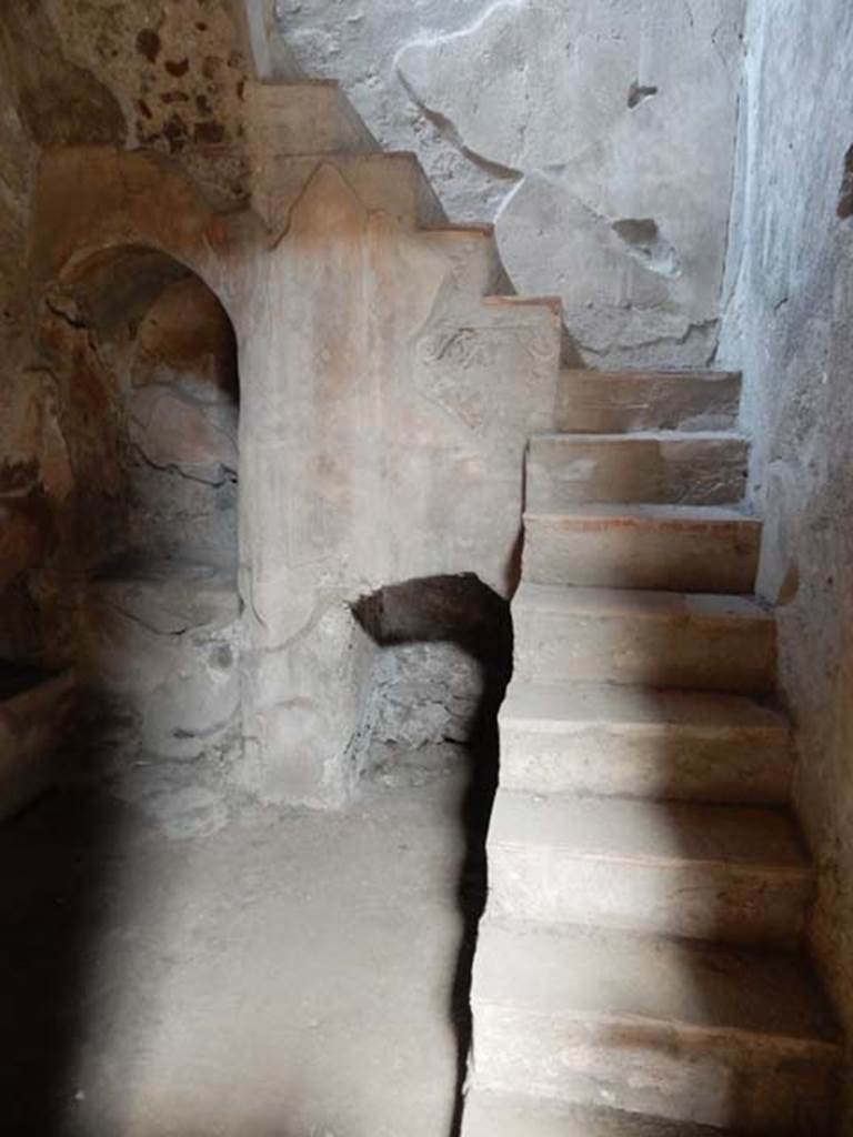 I.10.4 Pompeii. May 2015. Room 2, niche and recess below stairs to upper floor. 
Photo courtesy of Buzz Ferebee.