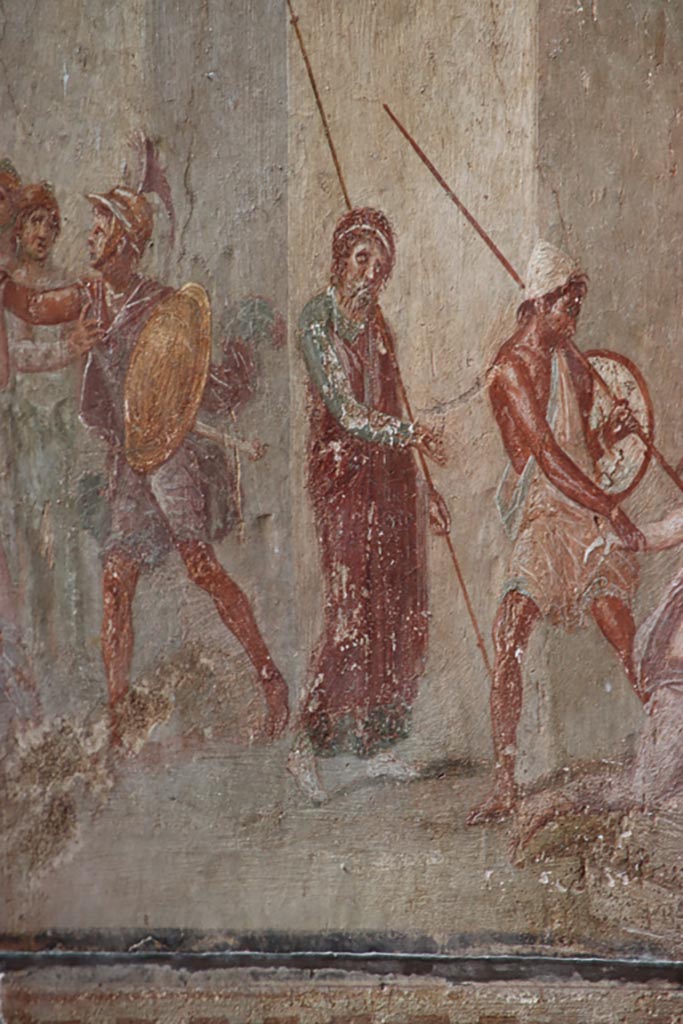 I.10.4 Pompeii. October 2023. 
Room 4, north wall, detail from mythological scene showing Ajax dragging Cassandra from the Palladium before the eyes of Priam.
Photo courtesy of Klaus Heese.