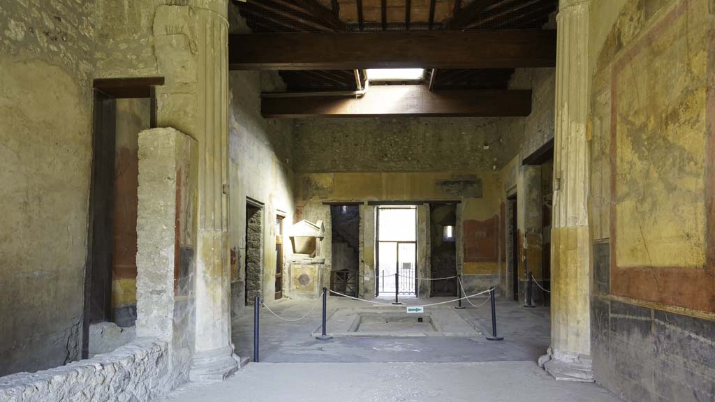 I.10.4 Pompeii. August 2021. 
Room 8, looking north from tablinum across impluvium in atrium, with compluvium above, towards entrance doorway.
Photo courtesy of Robert Hanson.