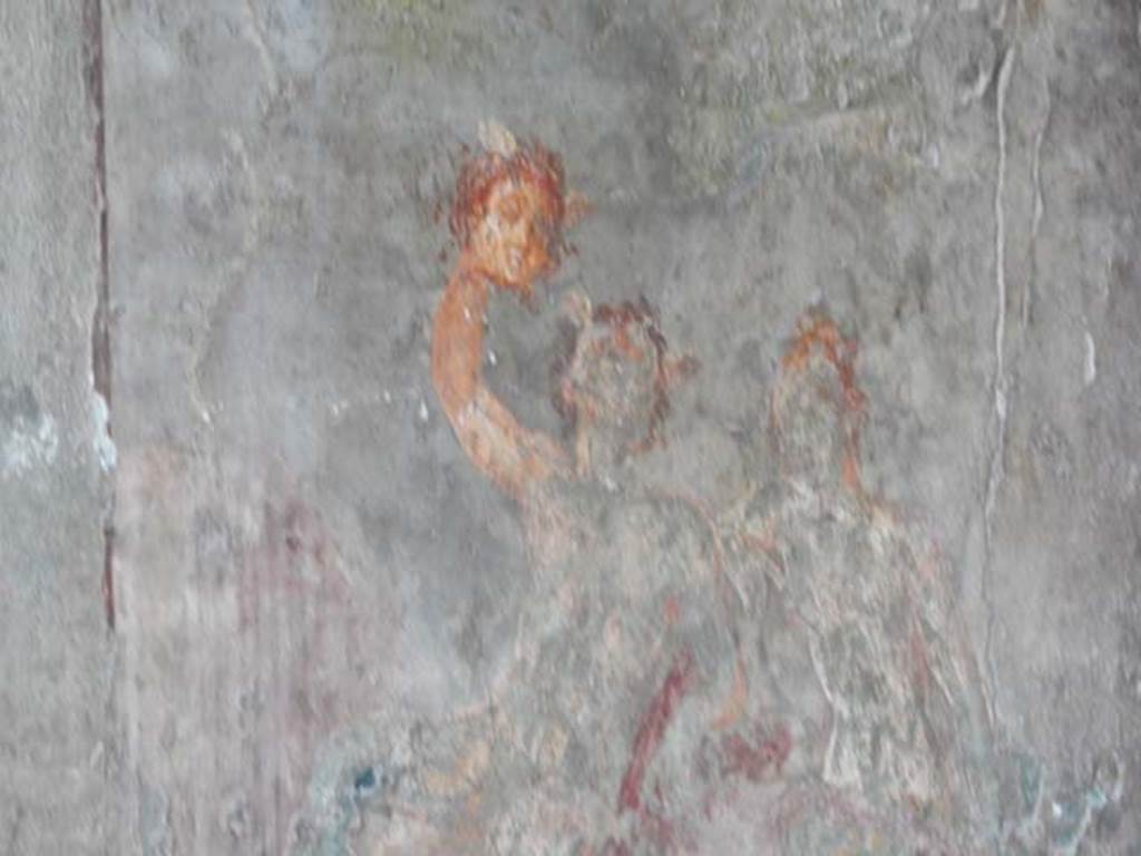 I.10.4 Pompeii. May 2015. Room 11, detail of painting of Andromeda and Perseus, with the head of the Gorgon held high. Photo courtesy of Buzz Ferebee.