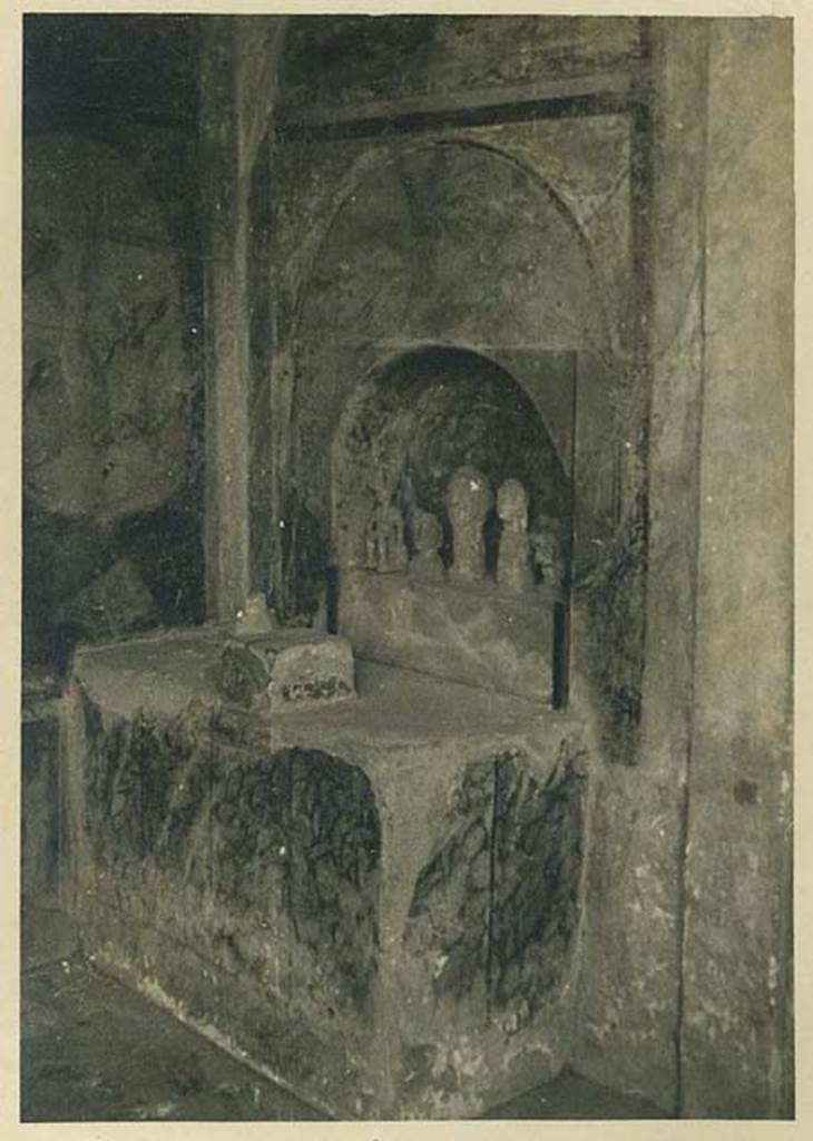I.10.4 Pompeii. 4th October 1937. Alcove 25 in south-west corner of peristyle. 
Lararium or domestic shrine with built in altar and apsed niche. Photo courtesy of Rick Bauer.