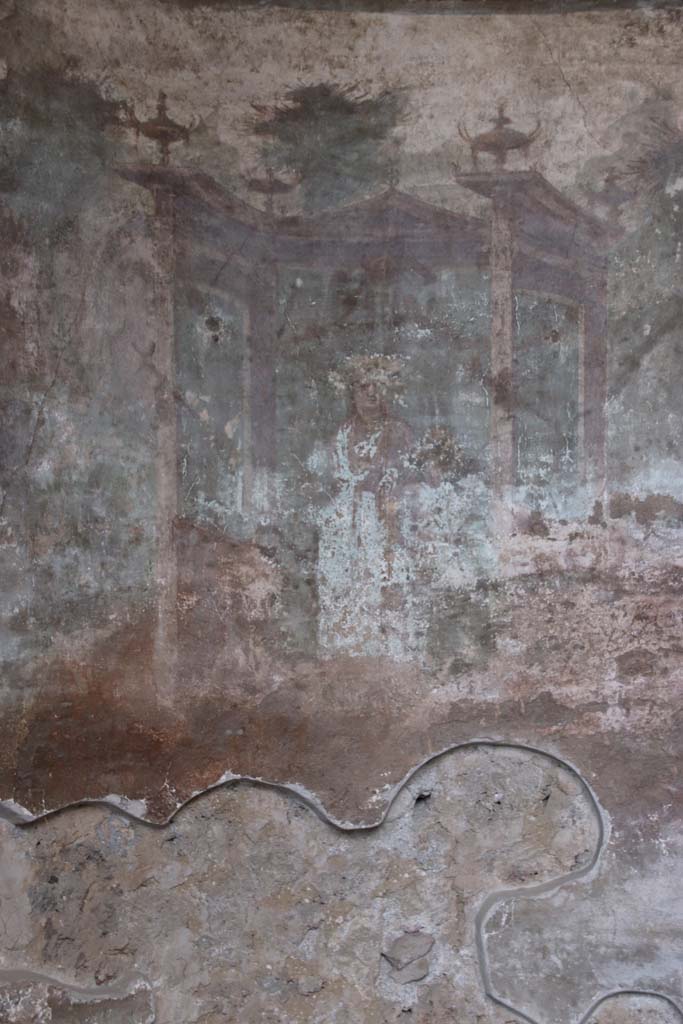 I.10.4 Pompeii. September 2021. 
Alcove 24, detail of painted Venus and cherubs in temple. Photo courtesy of Klaus Heese.