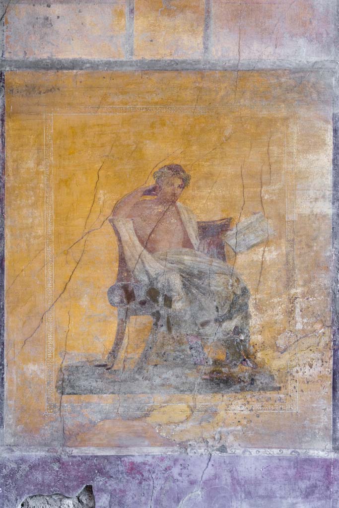 I.10.4 Pompeii. April 2022. 
Alcove 23, wall painting of poet on west wall of alcove. Photo courtesy of Johannes Eber.