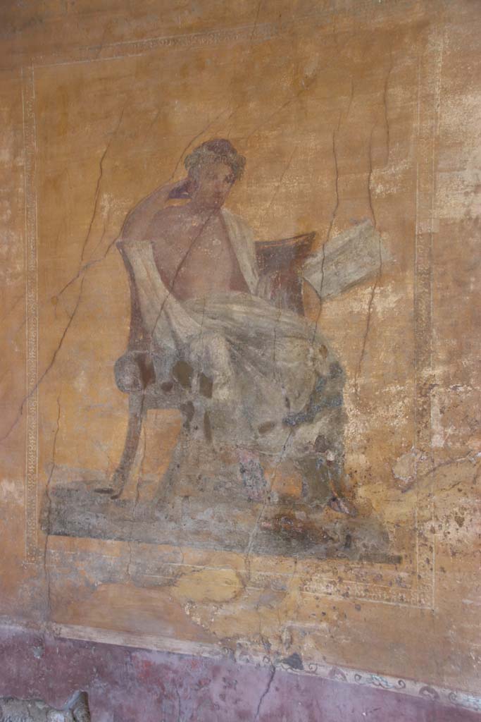 I.10.4 Pompeii. September 2021. 
Alcove 23, west wall with wall painting of poet. Photo courtesy of Klaus Heese.