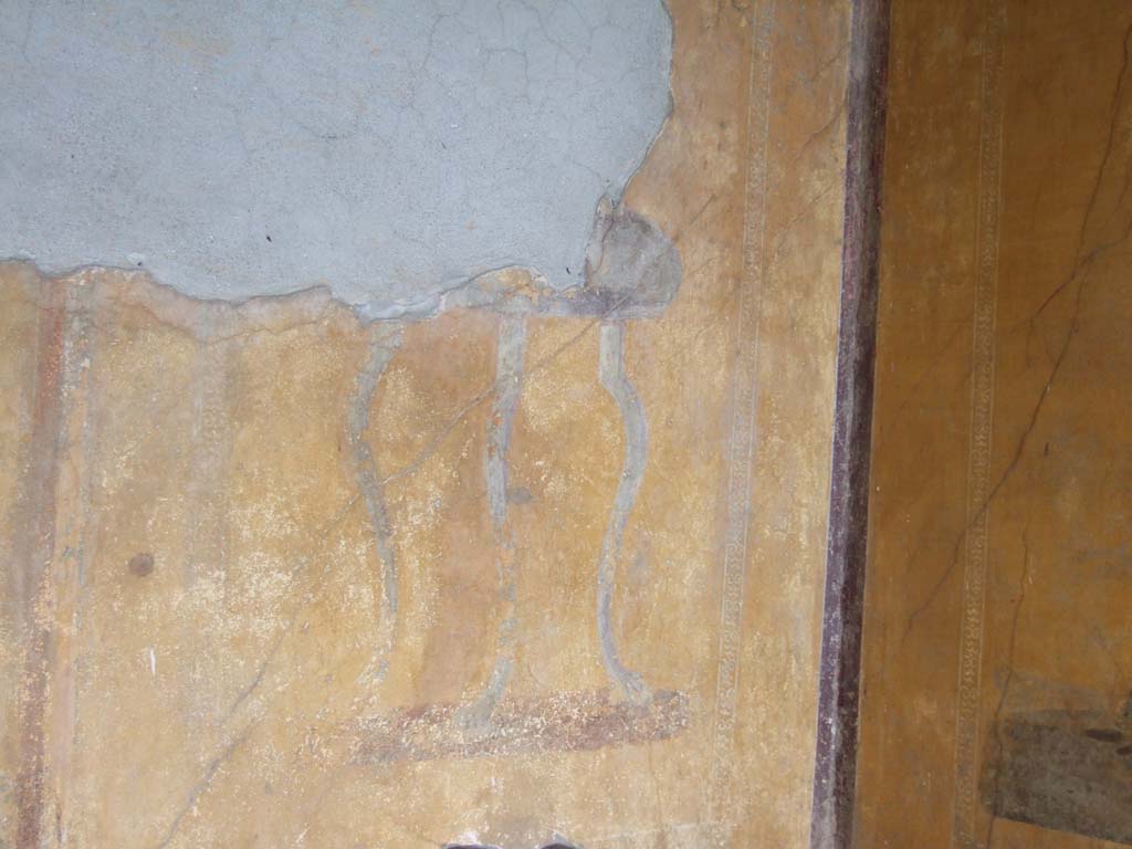 I.10.4 Pompeii. May 2006. Alcove 24, south wall at west end. Detail of wall painting of table.
