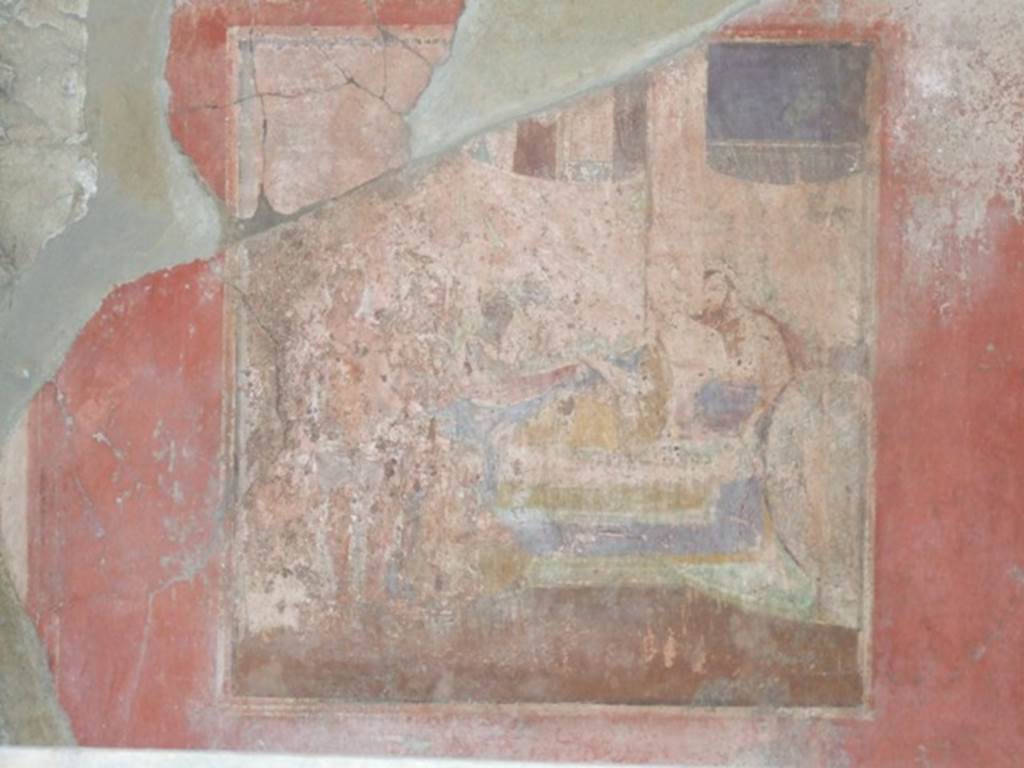 I.10.7 Pompeii. March 2009. Room 8, wall painting of the Sacrifice of Sophonisba, a banqueting scene, from north wall.
According to NdS –
“Of the three paintings which decorated the walls of this room, the one from the east wall was completely ruined by the fall of the wall,
the one from the west wall was strongly deteriorated, the only one found in a good condition of conservation was the one from the north wall.”
See Notizie degli Scavi, 1934, p.282.