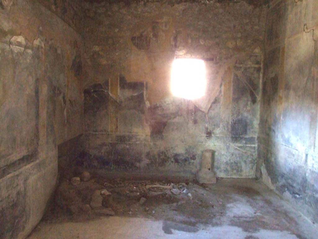 I.10.7 Pompeii. March 2009. Room 12, looking north in triclinium.  
According to Peters, the central pictures on the northern and eastern walls have almost completely disappeared.
The subject of the one in the centre of the northern wall was “Paris and Hermes on Mount Ida”.
See Peters, W.J.T. (1963): Landscape in Romano-Campanian Mural Paintings.The Netherland, Van Gorcum & Comp. (p.90)
