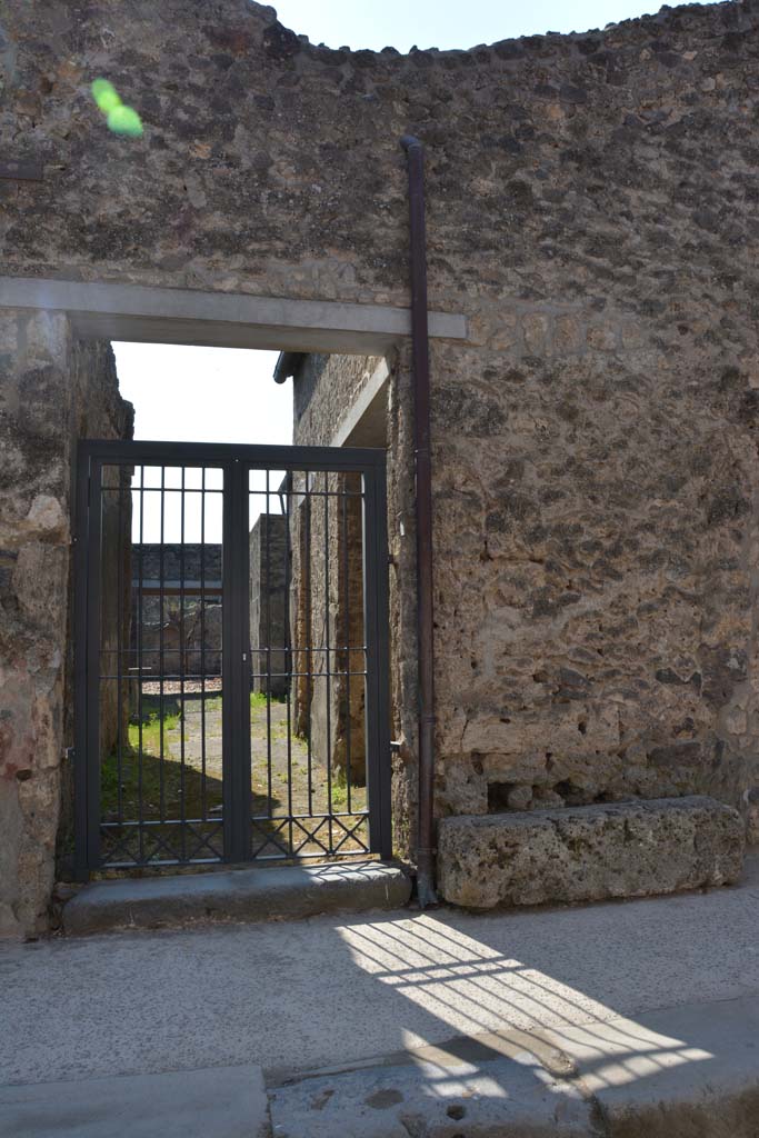 I.10.7 Pompeii. April 2017. Entrance doorway. Photo courtesy Adrian Hielscher.
According to NdS –
“Of all the large and small houses, of this insula, with the exception of the Casa del Menandro, this dwelling although modest, was the one that provided the most finds. A great deal of material was found in every room of the house, in which the number of objects, having a character of practical usefulness and intrinsic value, was remarkable.”
See Notizie degli Scavi, 1934,  (p.292)
For details of finds and their locations, 
See Notizie degli Scavi, 1934,  (p.292-308)
For details of “finds” from this house,
See Allison, P.M. (2006). The Insula of the Menander at Pompeii: Vol. III The finds, Clarendon Press, Oxford, (p.158-213, & p.337-349, & Suppl. p.275-283).
See Online Companion with details and photographs of finds from I.10.7.