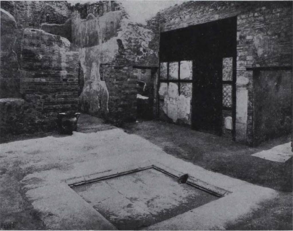 I.10.8 Pompeii. Looking towards south-east corner of atrium, and doorway to room 8, tablinum.
According to NdS, this room was not the tablinum but was a day-bedroom (cubicolo diurno). The room obtained by a screen of opus craticium with wood and masonry was an almost square day-room, in which found on the rustic floor in the ash was an imprint of the shape of a low and wide bed with wooden frame. 
Il vano ricavato da un tramezzo ad opus craticium ad ossatura di legno e di fabbrica era un cubicolo diurno quasi quadrato; nel quale sul rustico pavimento a piano di fabbrica era rimasta conservata nella cenere l’impronta di un basso e largo letto a telaio di legno.
See Notizie degli Scavi, 1934, p. 312-3, fig. 25.