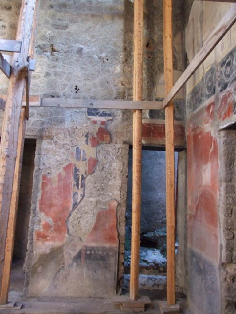 I.10.11 Pompeii.  March 2009.  Room 2.  Atrium.  Wall in south west corner between rooms 5 and 4.