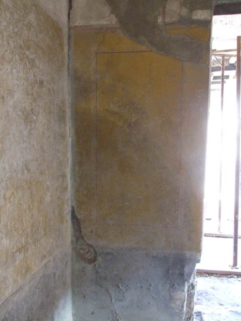 I.10.11 Pompeii. March 2009. Room 8, painting of a flying figure? from east wall in north-east corner of triclinium.