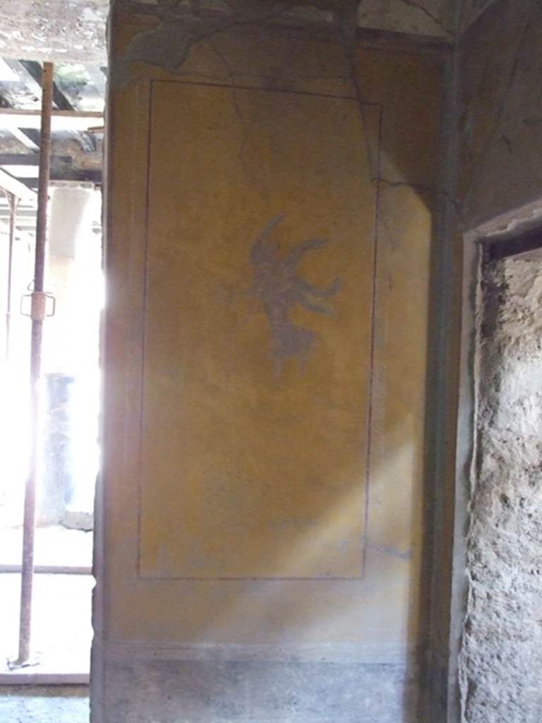 I.10.11 Pompeii. March 2009. 
Room 8, painting of a flying figure from east wall in south-east corner of triclinium.
