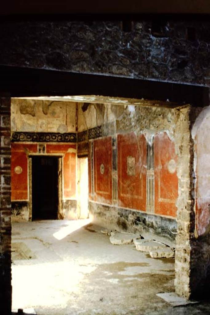 I.10.11 Pompeii. 1959. Room 2, looking west along north side of atrium from doorway from peristyle.  Photo by Stanley A. Jashemski.
Source: The Wilhelmina and Stanley A. Jashemski archive in the University of Maryland Library, Special Collections (See collection page) and made available under the Creative Commons Attribution-Non Commercial License v.4. See Licence and use details.
J59f0290