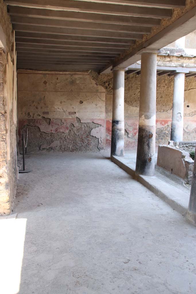 I.10.11 Pompeii. September 2021. 
Room 10, looking north along west portico. Photo courtesy of Klaus Heese.