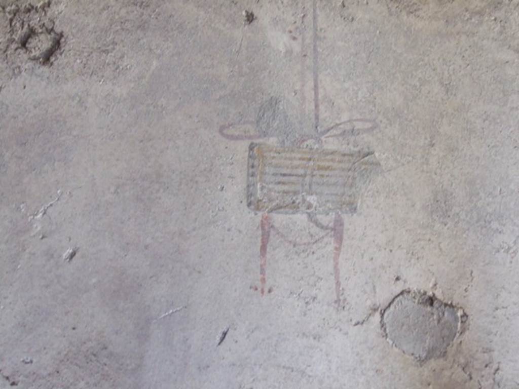 I.10.11 Pompeii. March 2009. Room 10, painting of hanging reed pipes from west end of north wall of peristyle.  See Bragantini, de Vos, Badoni, 1981. Pitture e Pavimenti di Pompei, Parte 1. Rome: ICCD.  (p.145).