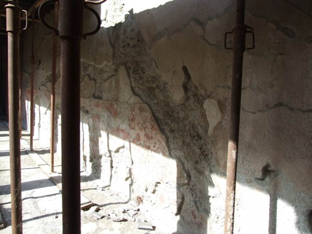 I.10.11 Pompeii. March 2009. 
Room 10, looking west along north wall, showing  outline of staircase to upper floor in plaster on north wall of peristyle.