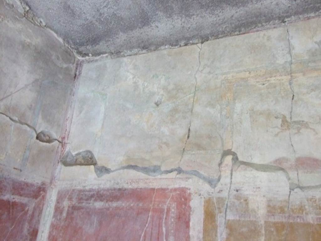 I.10.11 Pompeii.  March 2009.  Room 12.  Cubiculum.  East wall.  Upper part.