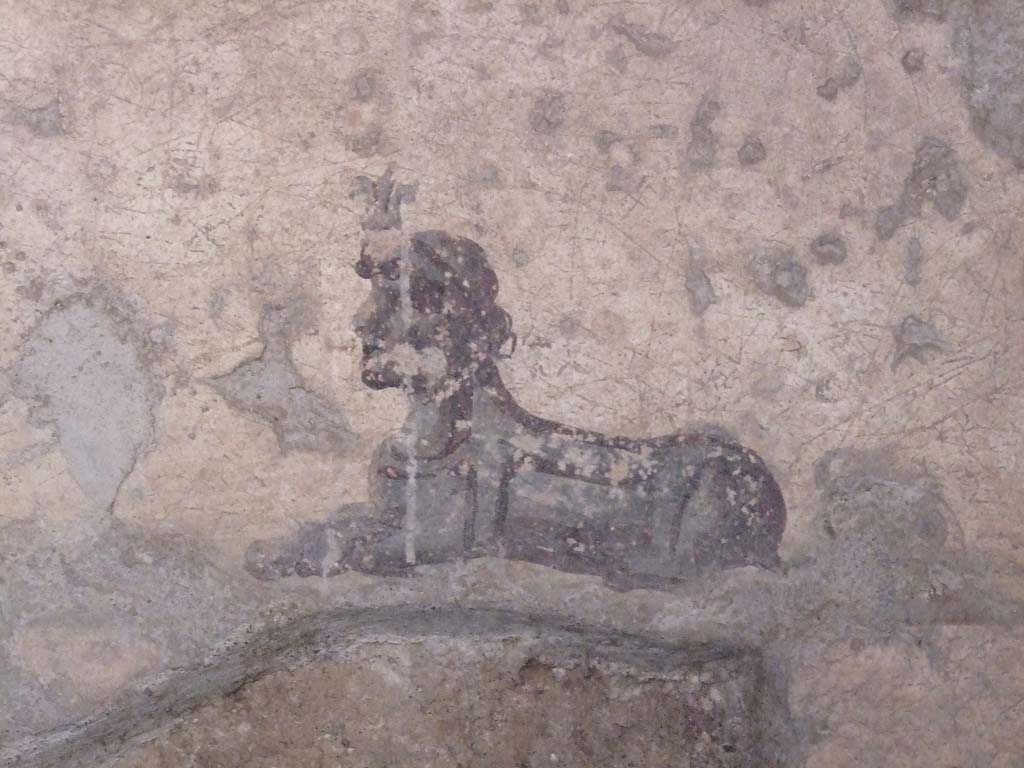 I.10.11 Pompeii. March 2009. Room 7, painting of sphinx from centre of panel at west end of south wall of cubiculum. 
See Bragantini, de Vos, Badoni, 1981. Pitture e Pavimenti di Pompei, Parte 1. Rome: ICCD.  (p.143).