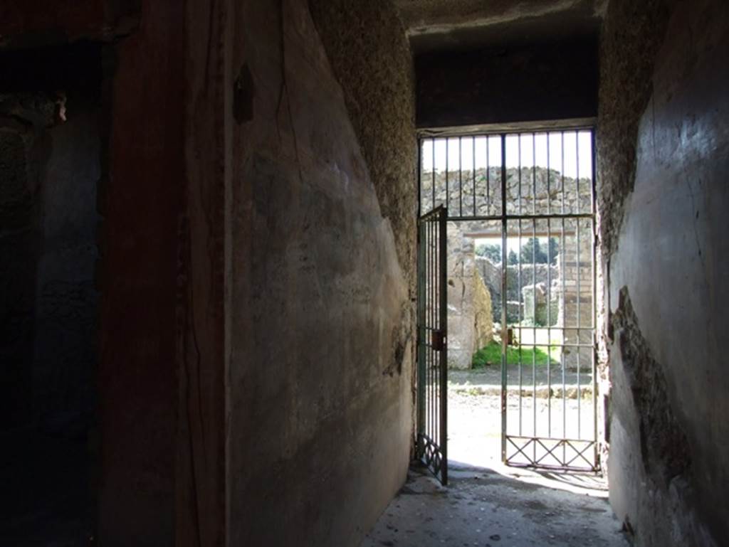 I.10.11 Pompeii. March 2009. Room 1, south wall of fauces or entrance corridor. Looking west.