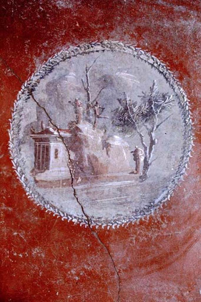 I.10.11 Pompeii, 1968.  Room 2, painted medallion of sacred landscape from north side of atrium.  
Photo by Stanley A. Jashemski.
Source: The Wilhelmina and Stanley A. Jashemski archive in the University of Maryland Library, Special Collections (See collection page) and made available under the Creative Commons Attribution-Non Commercial License v.4. See Licence and use details.
J68f0492