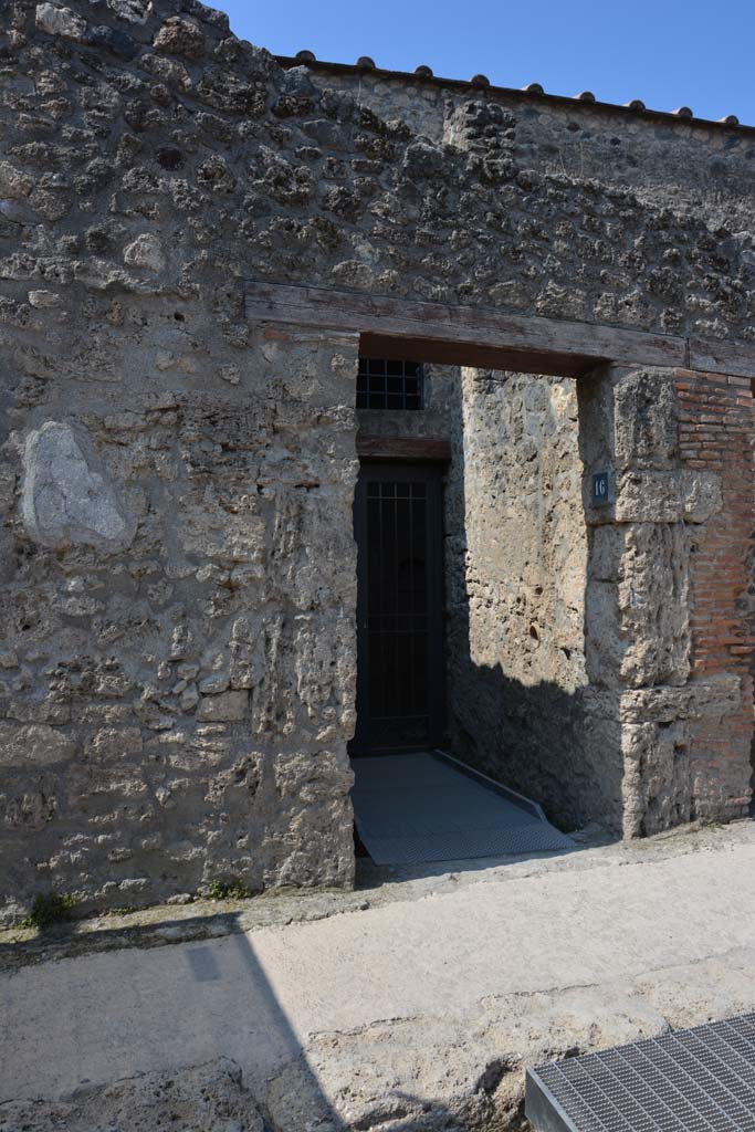 I.10.16 Pompeii. April 2017. Looking west to entrance doorway. 
Photo courtesy Adrian Hielscher.