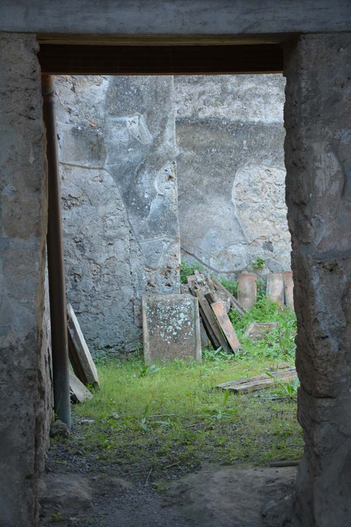 I.10.16 Pompeii. April 2017. Doorway to garden in west wall of atrium.
Photo courtesy Adrian Hielscher.