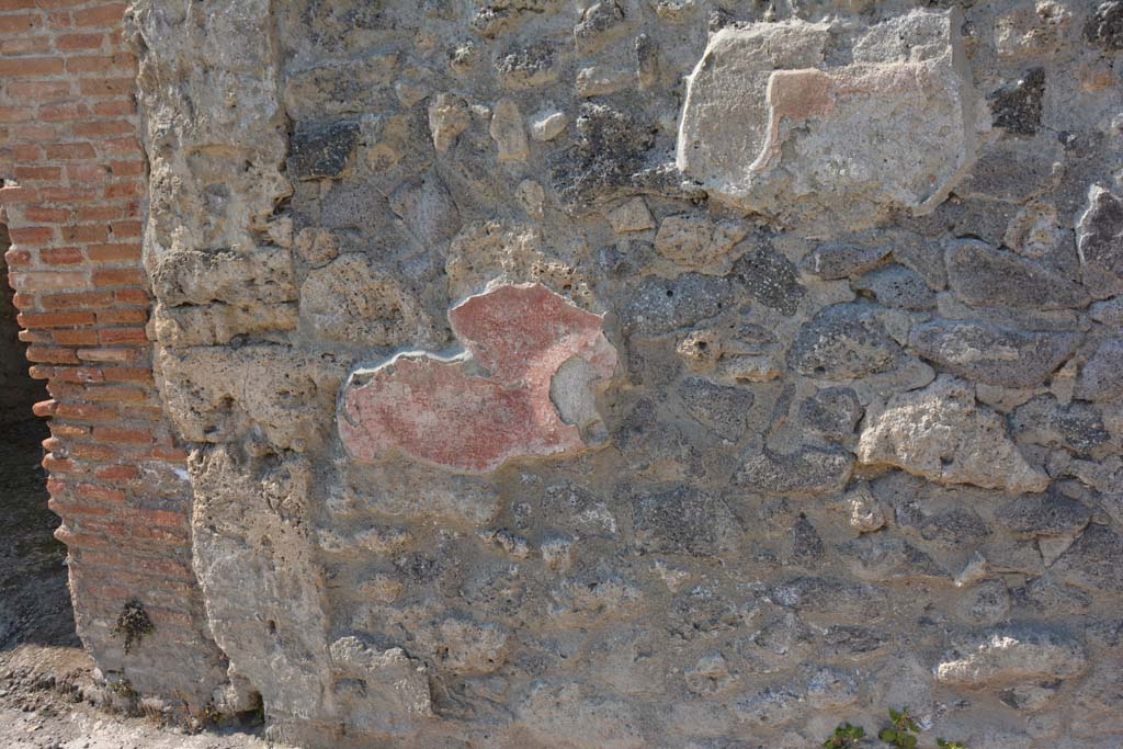 I.10.17 Pompeii. April 2017. Exterior wall on north side of doorway, but south of doorway to I.10.18. 
Photo courtesy Adrian Hielscher.