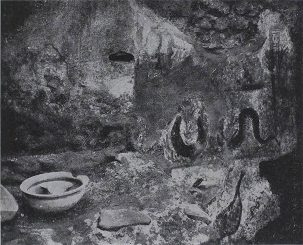 I.10.18 Pompeii. Lararium painting on south wall of the kitchen beside the hearth.
See Notizie degli Scavi di Antichità, 1934, p. 344, and fig.38.